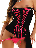 Crissy Moran posing in a corset and high heels